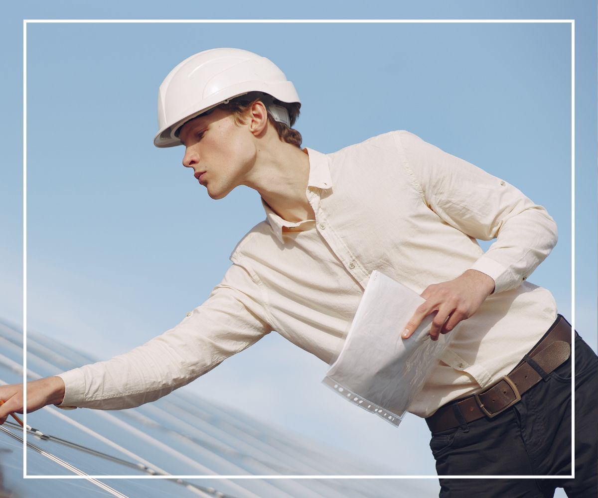 A roofing contractor inspects a roof