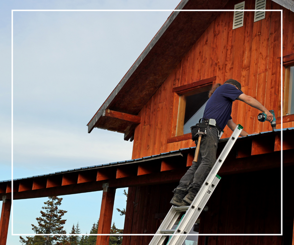 A roofing contractor performing repairs