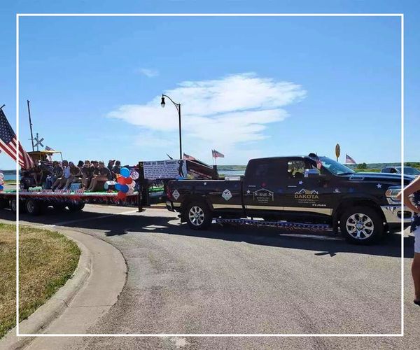 Dakota Roofing truck in a local parade