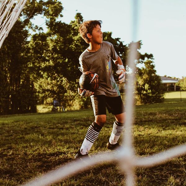 kid playing soccer