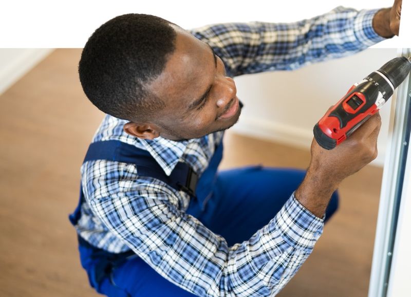 locksmith repairs lock on door