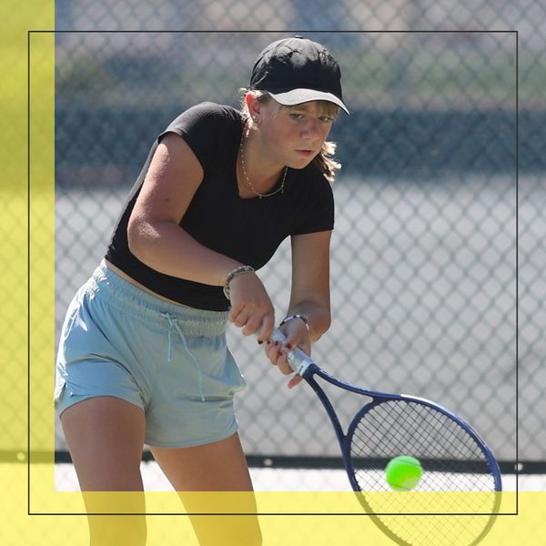 tennis player returning ball