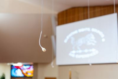microphone hanging from the ceiling