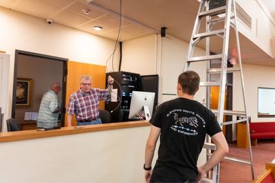 speaking to a client during setup
