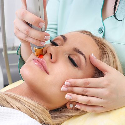 An image of a woman having a laser scar treatment