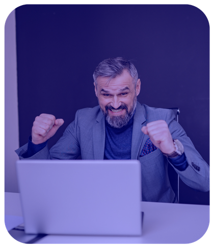 man pumping fists in air