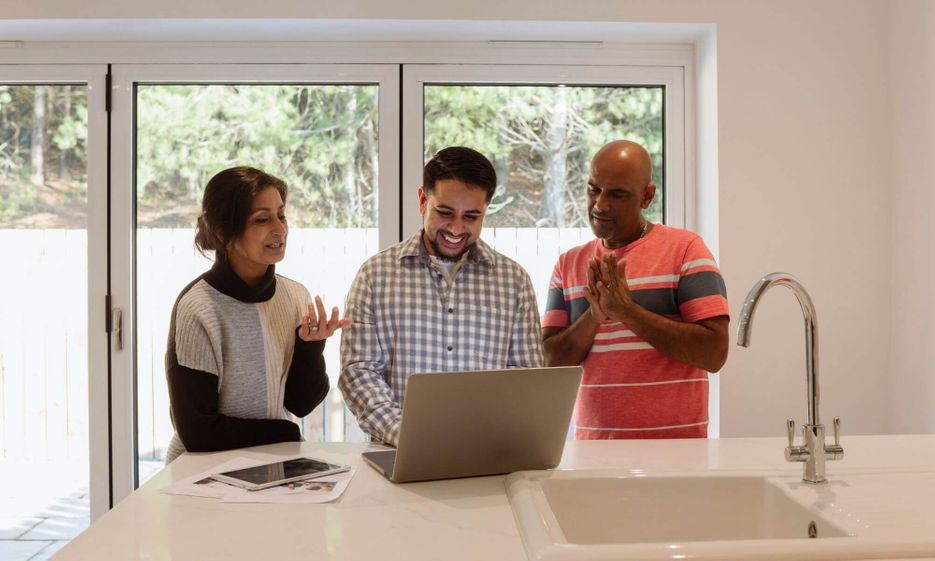 couple working with real estate agent