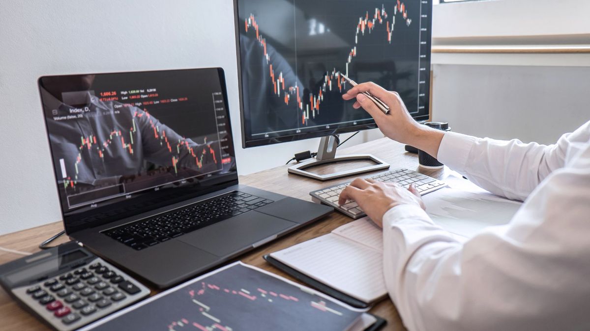 Someone looking at an investment portfolio. M23076 - Why Choose Our Global Broker Dealer Hero Image.jpg