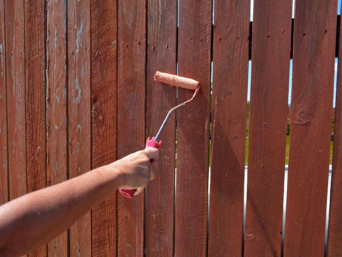 Wood Fence Painting in Gold Coast, Chicago