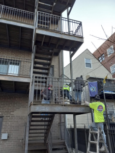 Fire Escape Installation Crew at Lincoln Square, Chicago Property