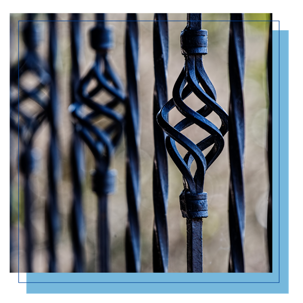 Designs in wrought iron fence