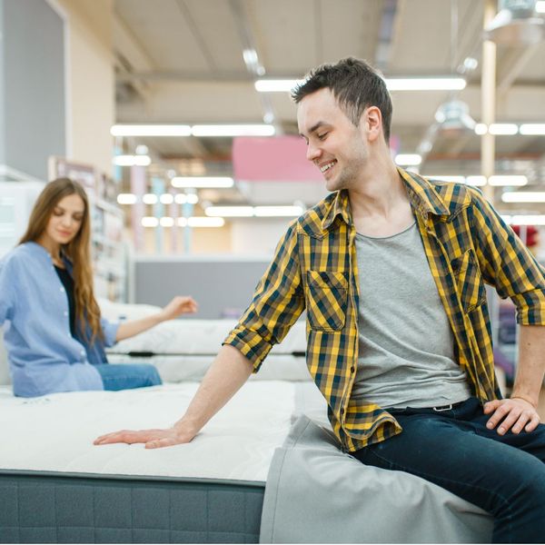 Image of people in a mattress store