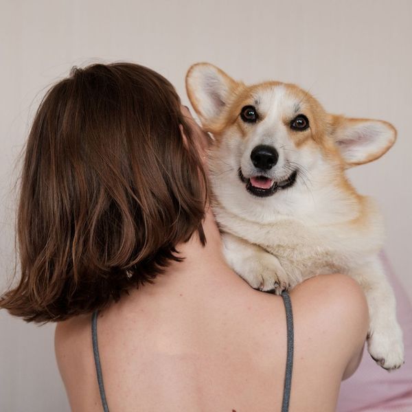 woman hugging her dog