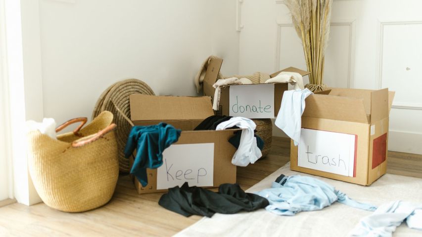 boxes labeled keep, donate, and trash