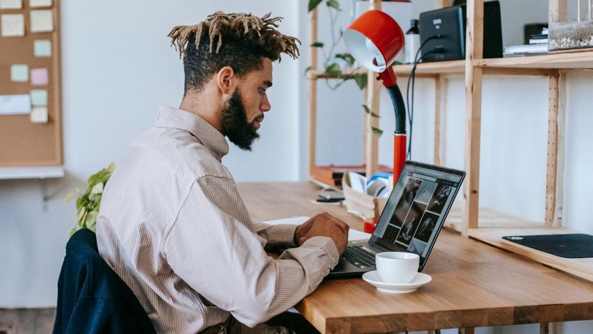 man working from home at his desk man working from home at his desk