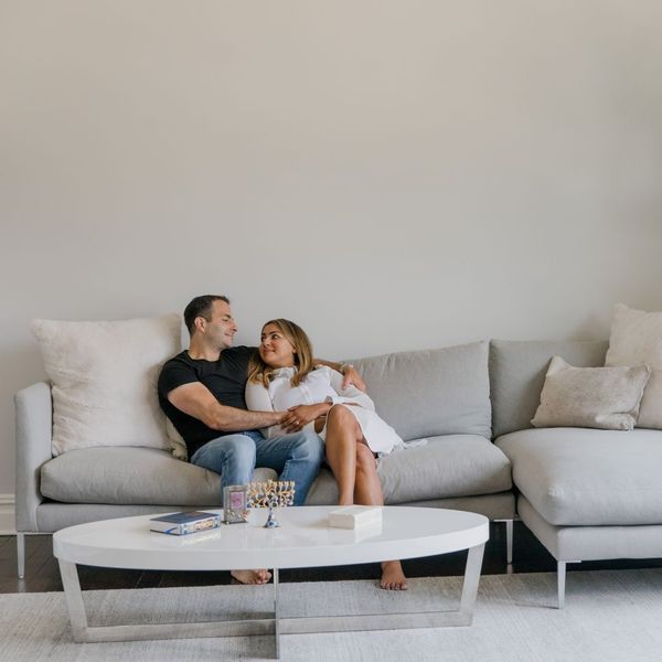 couple sitting on a couch couple sitting on a couch