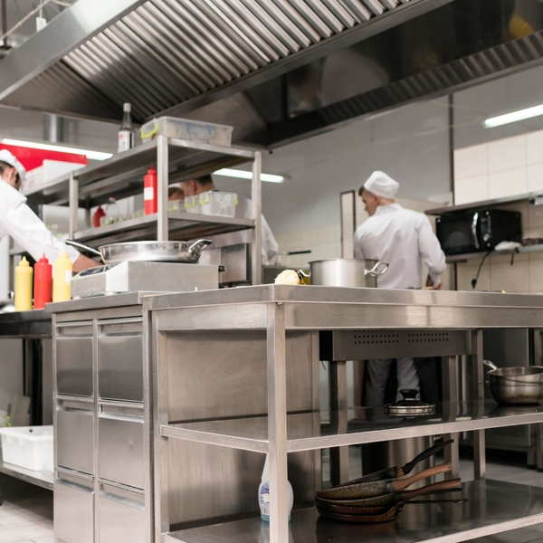 Chefs working in a clean restaurant kitchen
