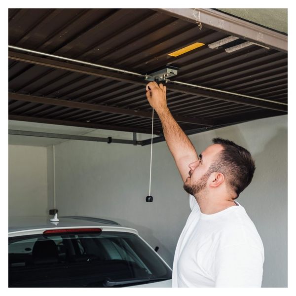 man opening garage door