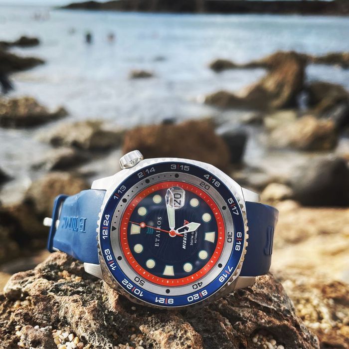 photo of an Etairos watch on a beach