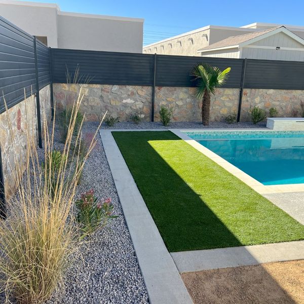 landscaping and hardscaping around pool