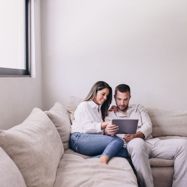 couple looking at ipad