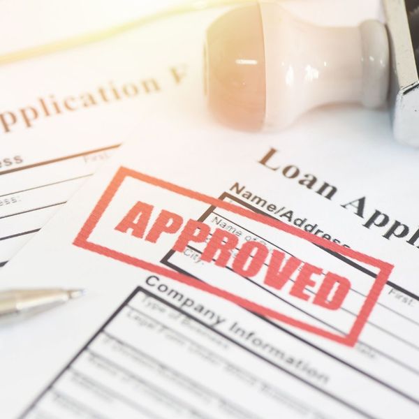 Loan documents that say "approved".