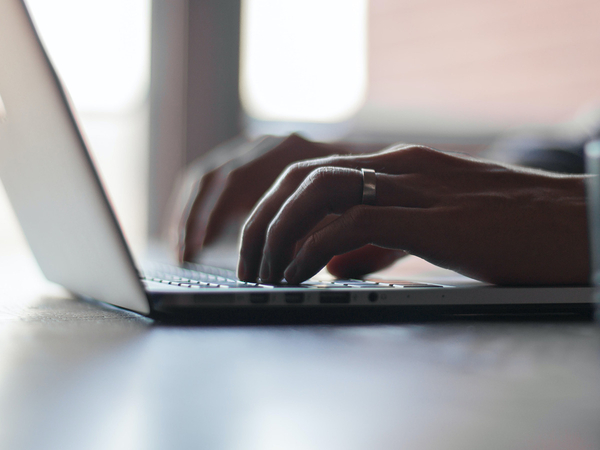 A lawyer using a laptop.