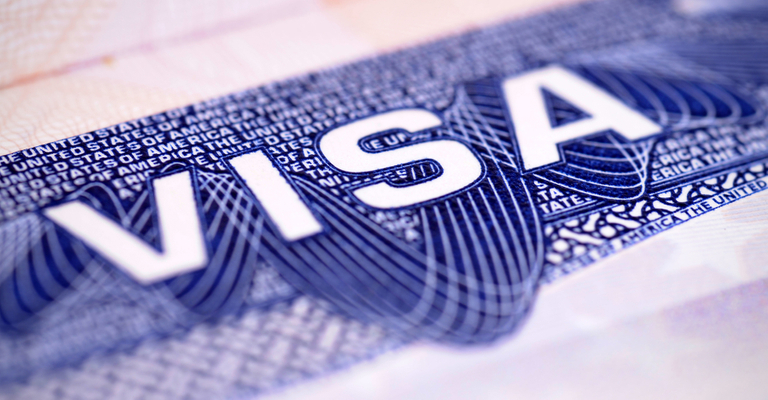 Close up of the word 'VISA' on a United States Visa