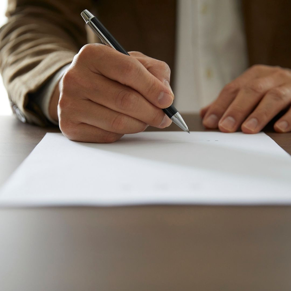 person filling out forms