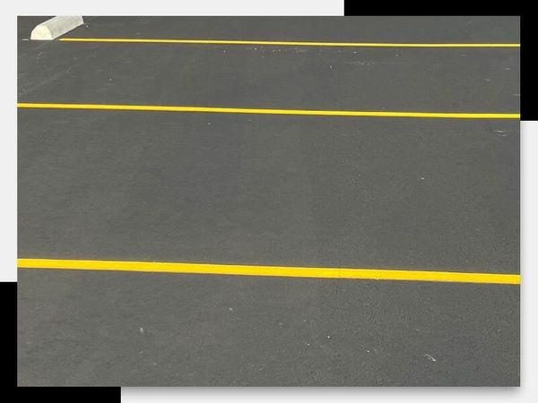 paved apartment parking lot with new lines