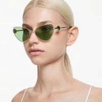 woman-wearing-green-cat-shaped-swarovski-sunglasses.jpg