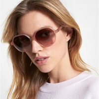 blond-woman-wearing-pink-colored-michael-kors-sunglasses.jpg