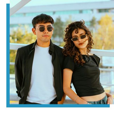 couple wearing designer sunglasses