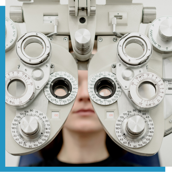 patient looking through a modern phoropter 