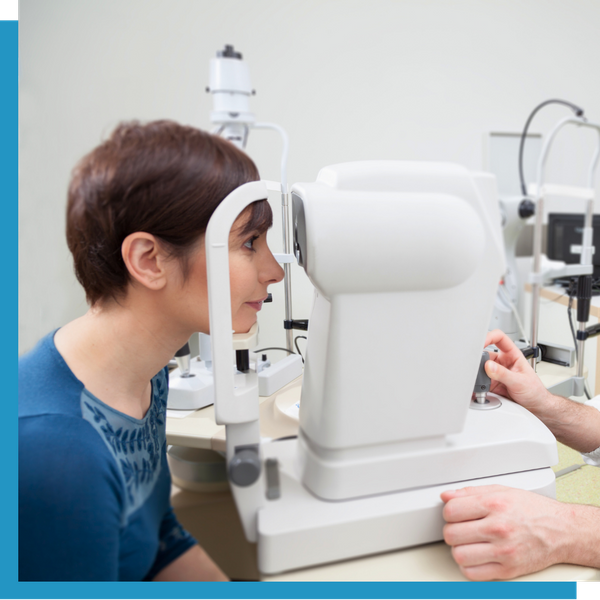 A woman at an eye exam.