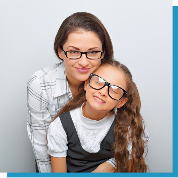A woman and her daughter wearing glasses.