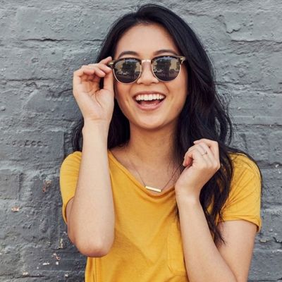 woman happy with sunglasses fit 