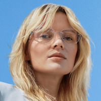 blond-woman-wearing-rimless-silhouette-eyeglasses.png