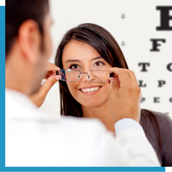 A woman getting an eye exam.