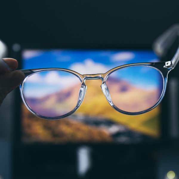 glasses in front of screen