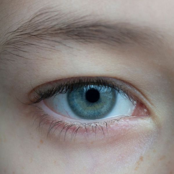 child's blue eye