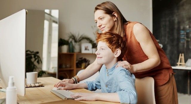 mother-and-son-in-front-working-on-the-computer.jpg