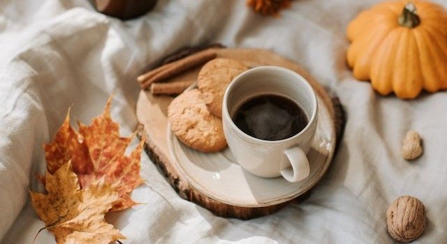 cup-of-coffee-and-autumn-leaves.jpg