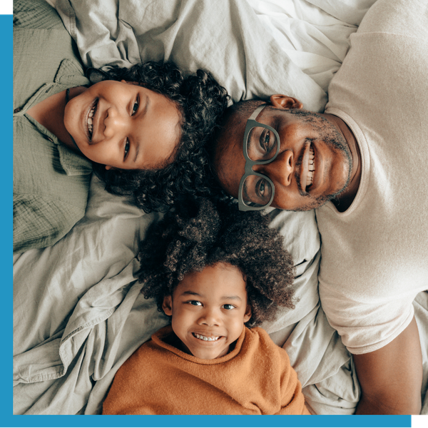 A happy family smiling.