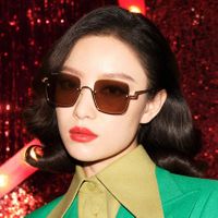 asian-woman-wearing-dark-tinted-gucci-sunglasses.jpg