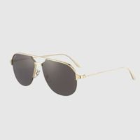 pair-of-gold-rimed-cartier-sunglasses.jpg