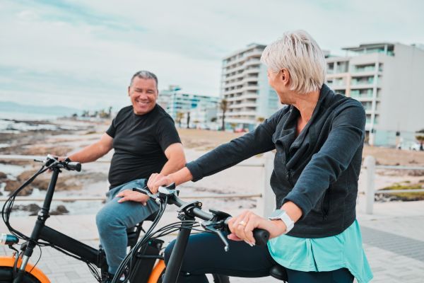 older couple riding ebikes