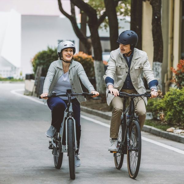 friends commuting on ebikes