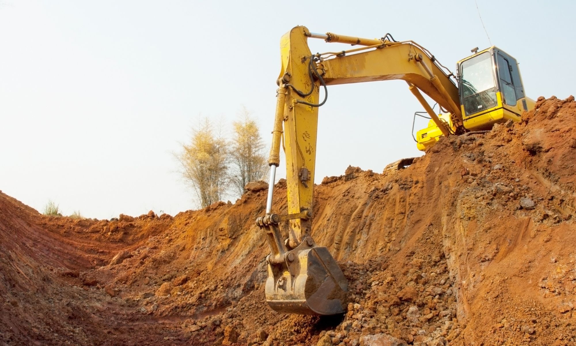 excavator digging a hole