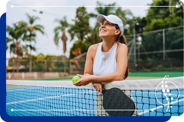a woman pickle ball player